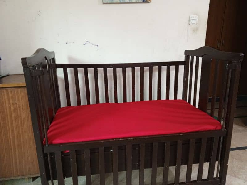 pure wooden baby cot for sale along with it's mattress 1