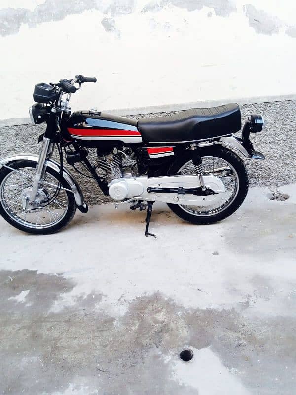 Honda 125 cc complete file 2003 model Lahore number 1