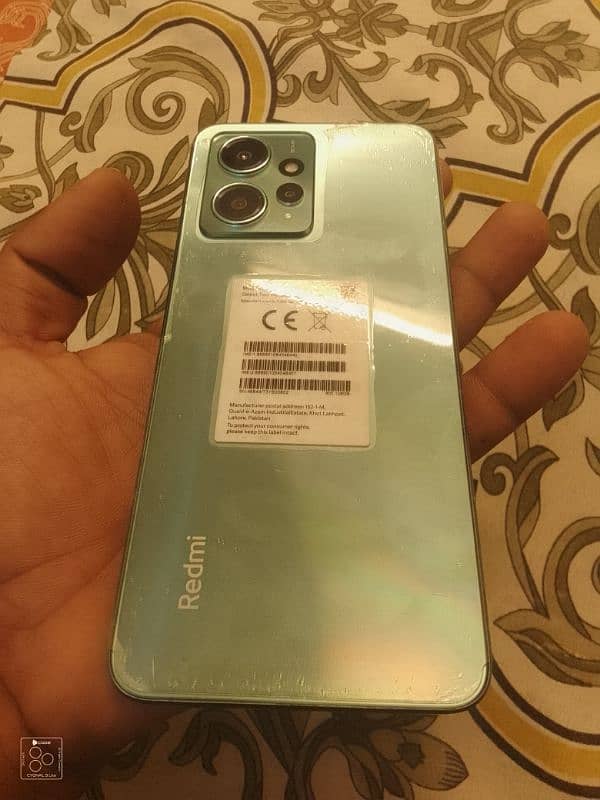 Redmi Note 12 Complete box few months used 0