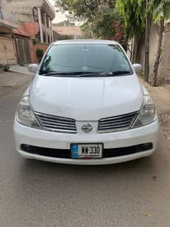 Nissan Tiida 2007 model 2012 registered car its own my name