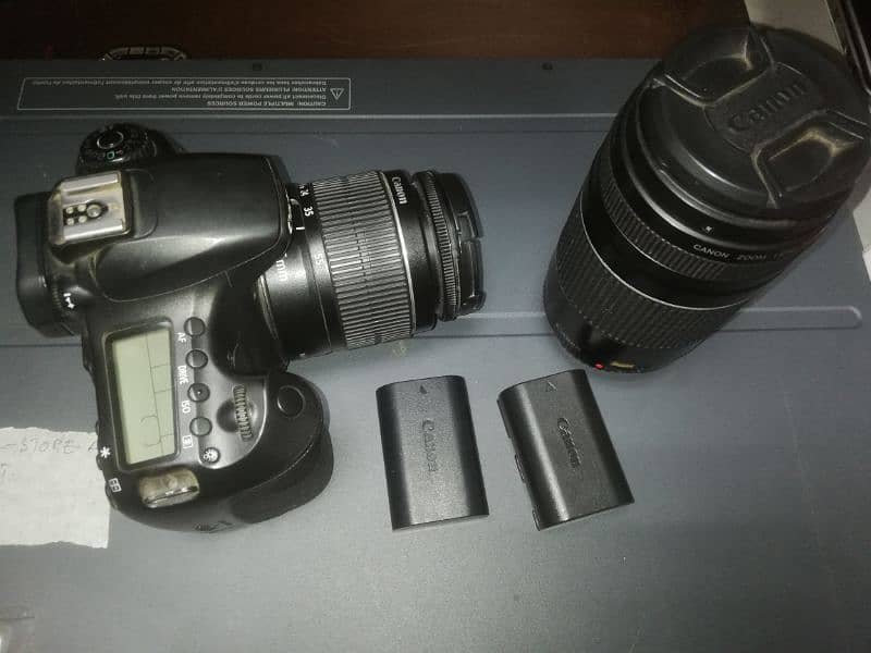 Canon 60d with 2 lenses and 2 batteries 0