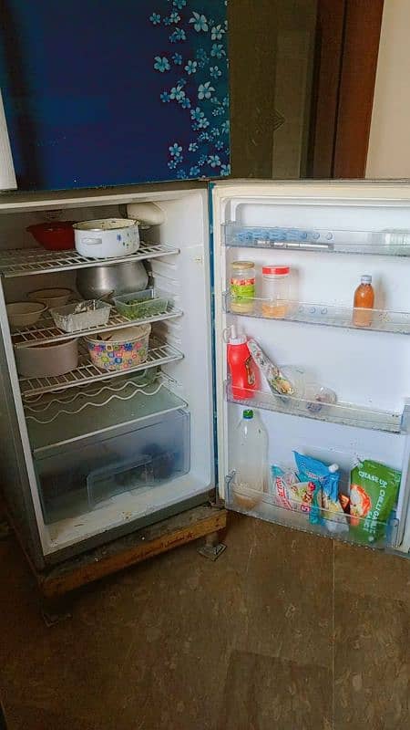 HAIER FULL SIZE FRIDGE. . . 1