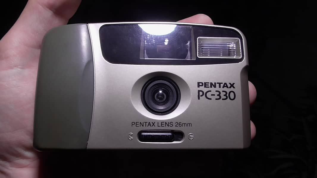 Pentax PC-330 is a compact, viewfinder camera  ONLY 3200 2