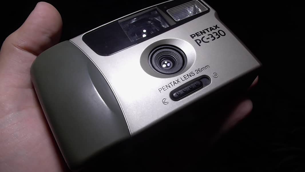 Pentax PC-330 is a compact, viewfinder camera  ONLY 3200 3