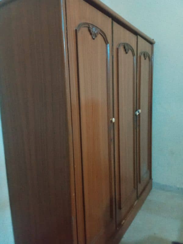 used wardrobe three door 2