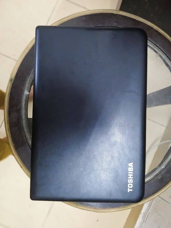 Toshiba laptop like new( charger free) 2