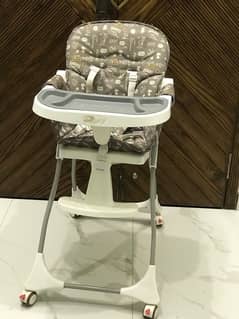 BRAND NEW HIGH CHAIR FOR SALE