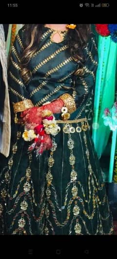 green lehenga with mirror work