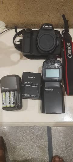 canon 6D body with flash and cell charger