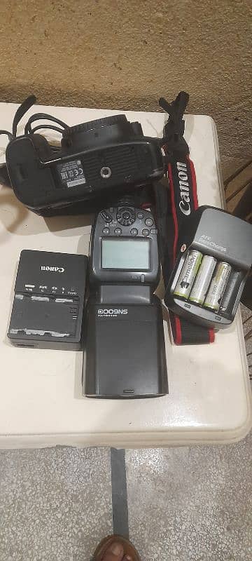 canon 6D body with flash and cell charger 7