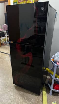 PEL refrigerator in black glass door with red design