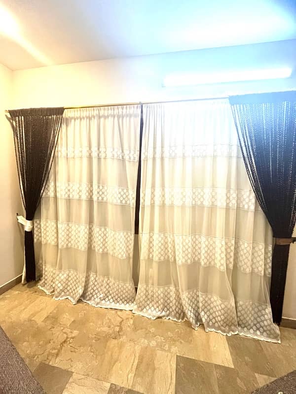 3 Types of Net nd Velvet Curtains of diffPrices 2,000 , 15,000, 30,000 1