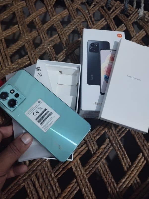 Urgent sale Redmi note 12 full box 8+8gb/128gb with warranty 1