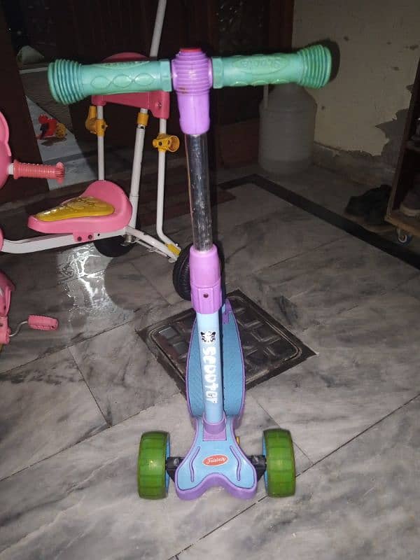 Scooty and tricycle for sale. 12k for both 1