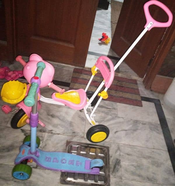 Scooty and tricycle for sale. 12k for both 7