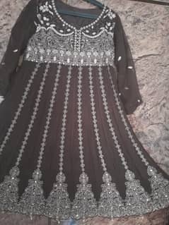 There is a very beautiful  frock with a lehenga