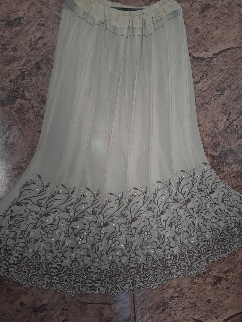 There is a very beautiful  frock with a lehenga 1