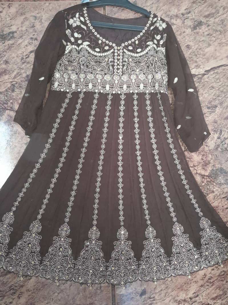 There is a very beautiful  frock with a lehenga 3