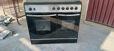 gas Oven + stove   in good condition