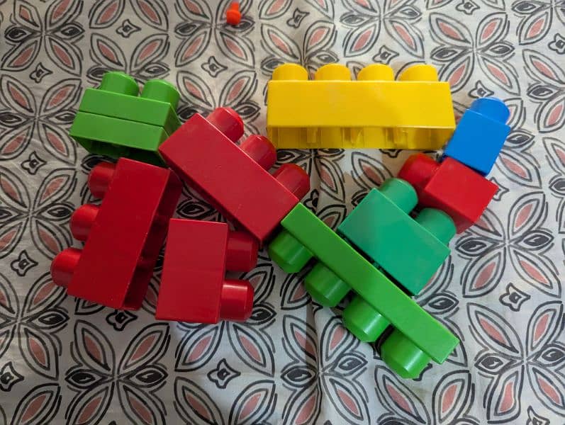 Mega blocks with red trolley little tikes 8