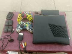 xbox 360 slim USA Model, with 20plus game 2 wireless controler 4 betry