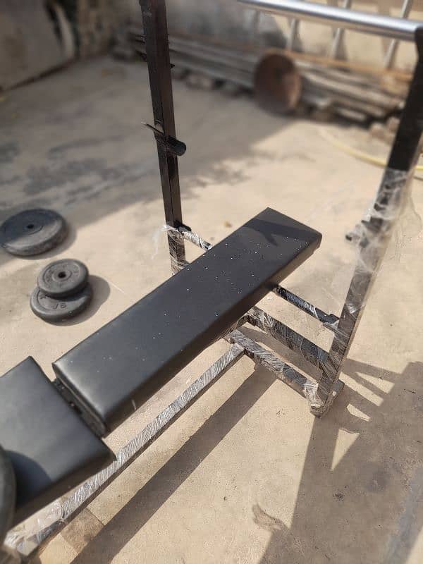 Bench , Barbell Bar , Dumbells , weights 9