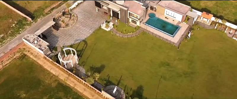 Luxurious 16 Kanal Farmhouse with Pool, 4 Bedrooms, Servant Quarters & Modern Amenities for Sale Gated Community 10