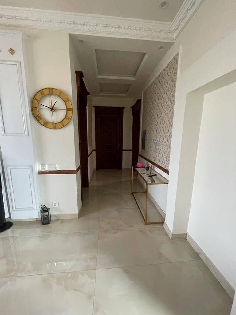 1 KANAL TILE FLOORING LOWER PORTION AVAILABLE FOR RENT IN OPF SOCIETY 0