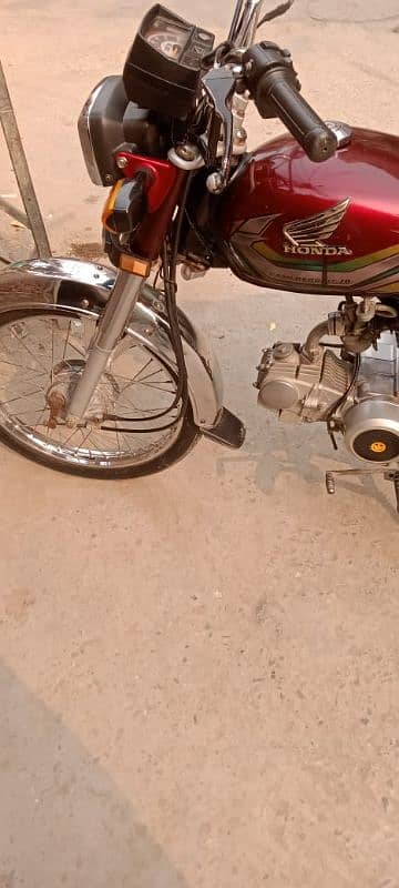 Honda 70 22/23 number lga hai good condition documents clear 12