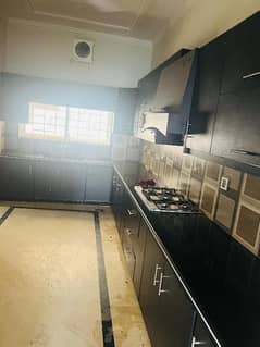 brand new lower portion for rent with real pics 3 bed rooms with attached bath and drawing daing tv loan kechin and 2 car parking available with Uper rentil famly