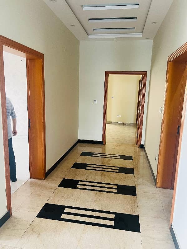 brand new lower portion for rent with real pics 3 bed rooms with attached bath and drawing daing tv loan kechin and 2 car parking available with Uper rentil famly 3