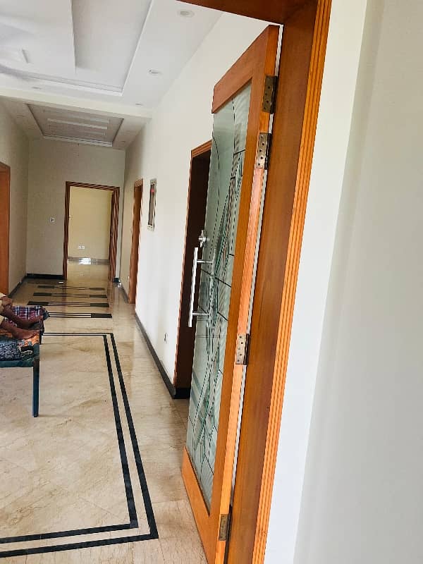 brand new lower portion for rent with real pics 3 bed rooms with attached bath and drawing daing tv loan kechin and 2 car parking available with Uper rentil famly 4