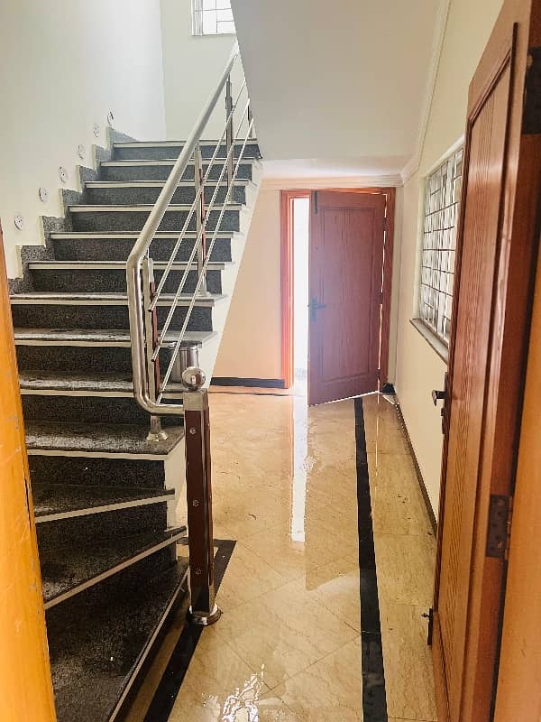 brand new lower portion for rent with real pics 3 bed rooms with attached bath and drawing daing tv loan kechin and 2 car parking available with Uper rentil famly 5