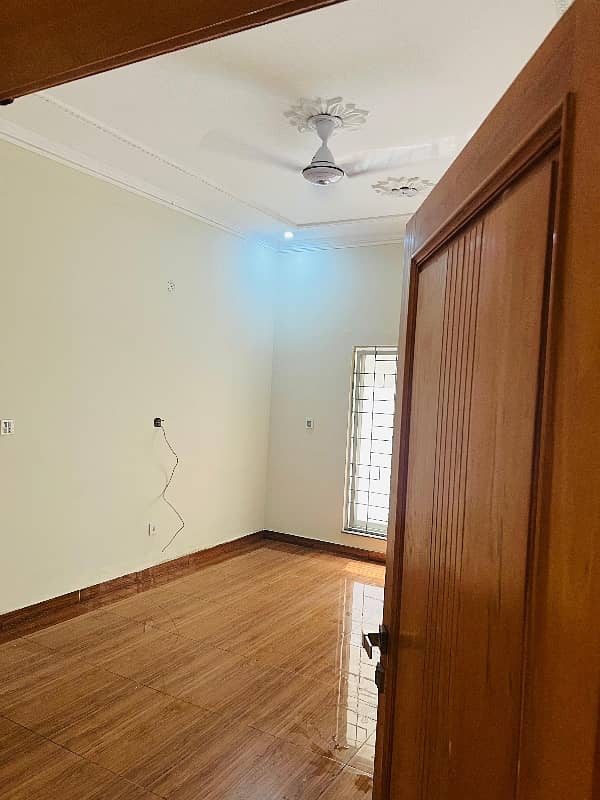 brand new lower portion for rent with real pics 3 bed rooms with attached bath and drawing daing tv loan kechin and 2 car parking available with Uper rentil famly 7