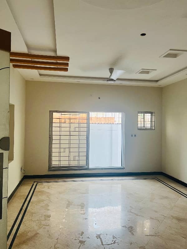 brand new lower portion for rent with real pics 3 bed rooms with attached bath and drawing daing tv loan kechin and 2 car parking available with Uper rentil famly 9