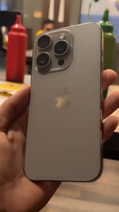 Iphone 15 pro natural titanium jv L/la 0