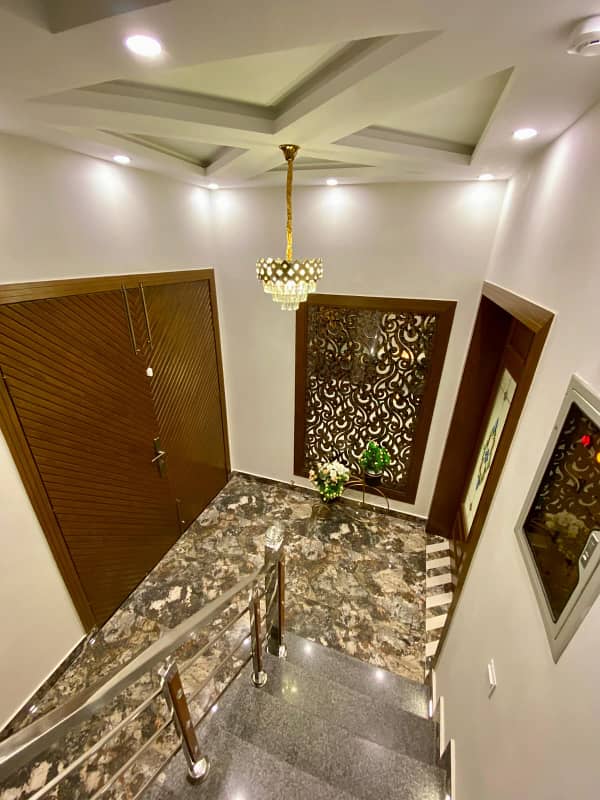 10 Marla Brand New Ideal Location Luxury Modern House For Rent in Phase 5 DHA Lahore 12