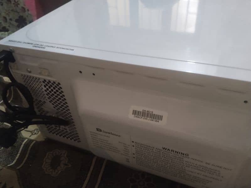 Brand New (untouched) -n: The Dawlance Microwave Oven MD 15 is 6