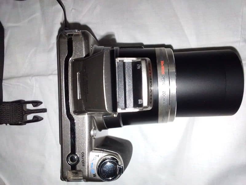 Olympus video and pics camera 3