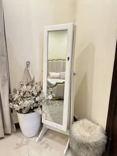 Full length mirror with jewellery storage