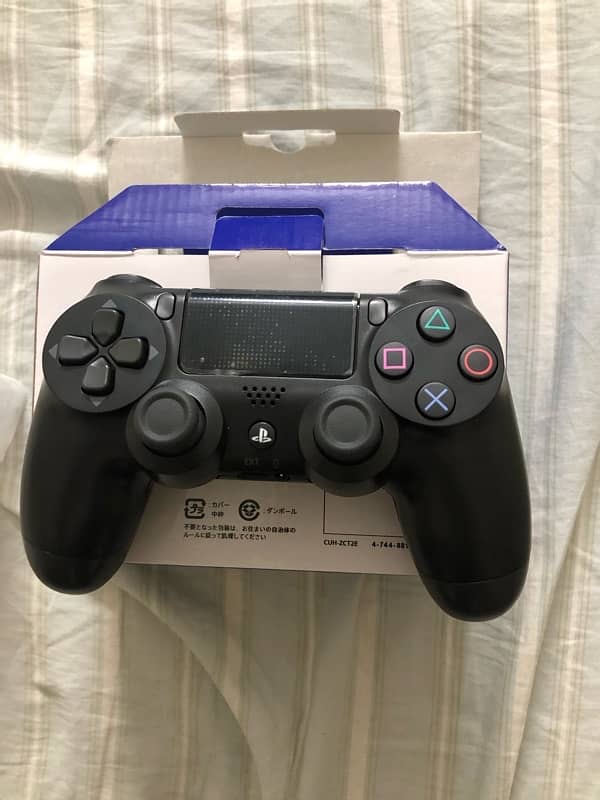 PS4 controller ORIGINAL V2 MINT CONDITION(negotiable) 0