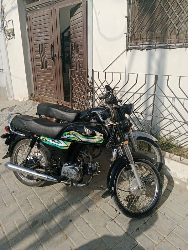 2 Honda CD 70 Bikes, Both have Same Digits Registration numbers. 1