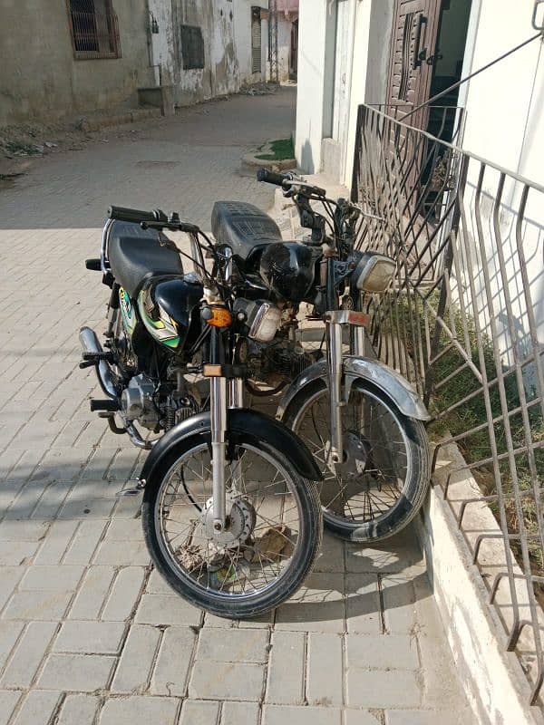 2 Honda CD 70 Bikes, Both have Same Digits Registration numbers. 2