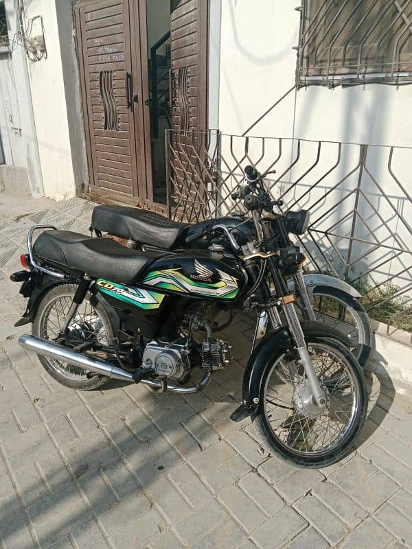 2 Honda CD 70 Bikes, Both have Same Digits Registration numbers. 3