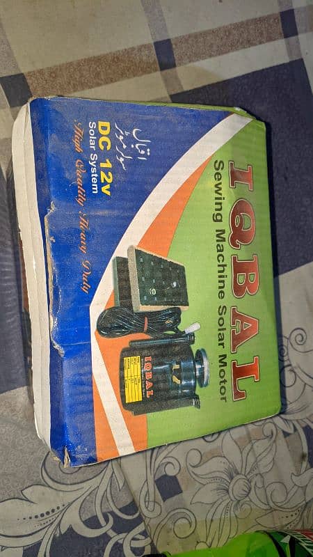 Iqbal sewing machine and solar motor 0