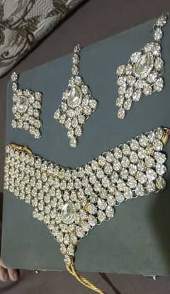 Silver bridal set embellished with shiny stones.