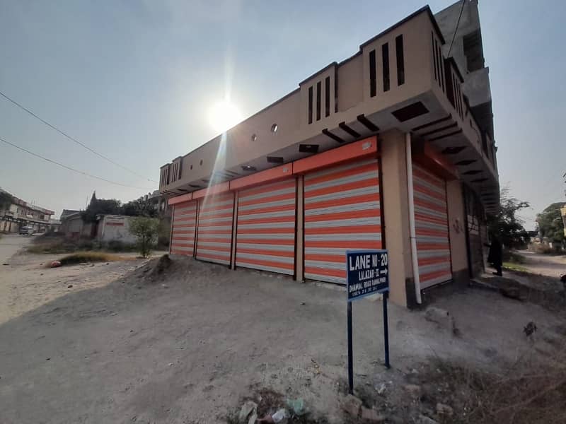 9 Marla Property Including 5 Marla Triple Storey House With 4 Shops Available For Sale In Lalazar2 2