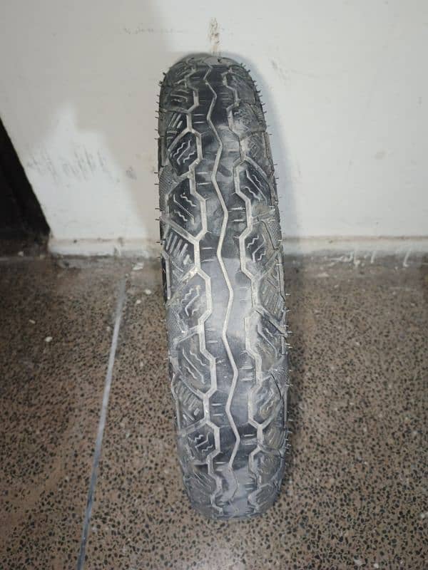 100/90/18 56 R tyre with tube 0