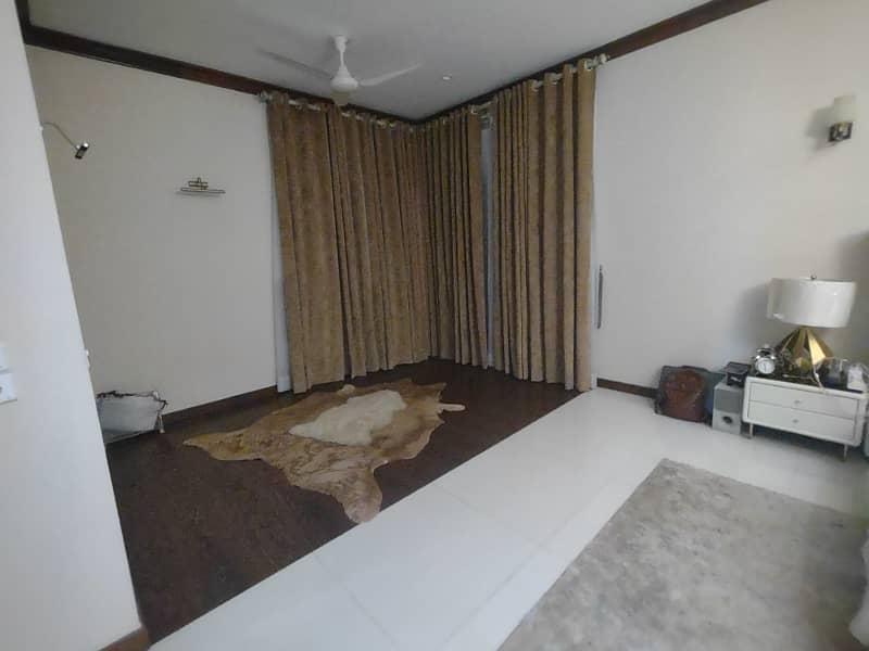 defence 1000 yards semi furnished bungalow for rent with basement swimming pool 5