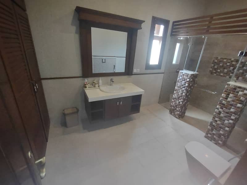 defence 1000 yards semi furnished bungalow for rent with basement swimming pool 11